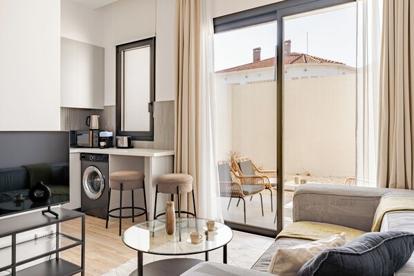 Deluxe Apartment, Non Smoking, Balcony | Living area