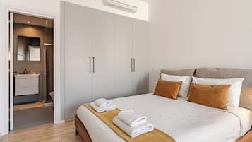 Deluxe Apartment, Non Smoking, Balcony | Desk, laptop workspace, blackout drapes, iron/ironing board