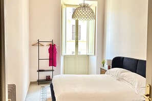 4 bedrooms, iron/ironing board, travel crib