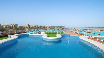 Outdoor pool, pool umbrellas, pool loungers