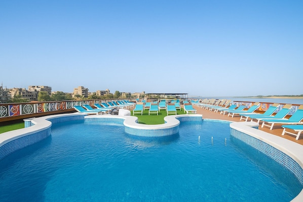 Outdoor pool, pool umbrellas, pool loungers