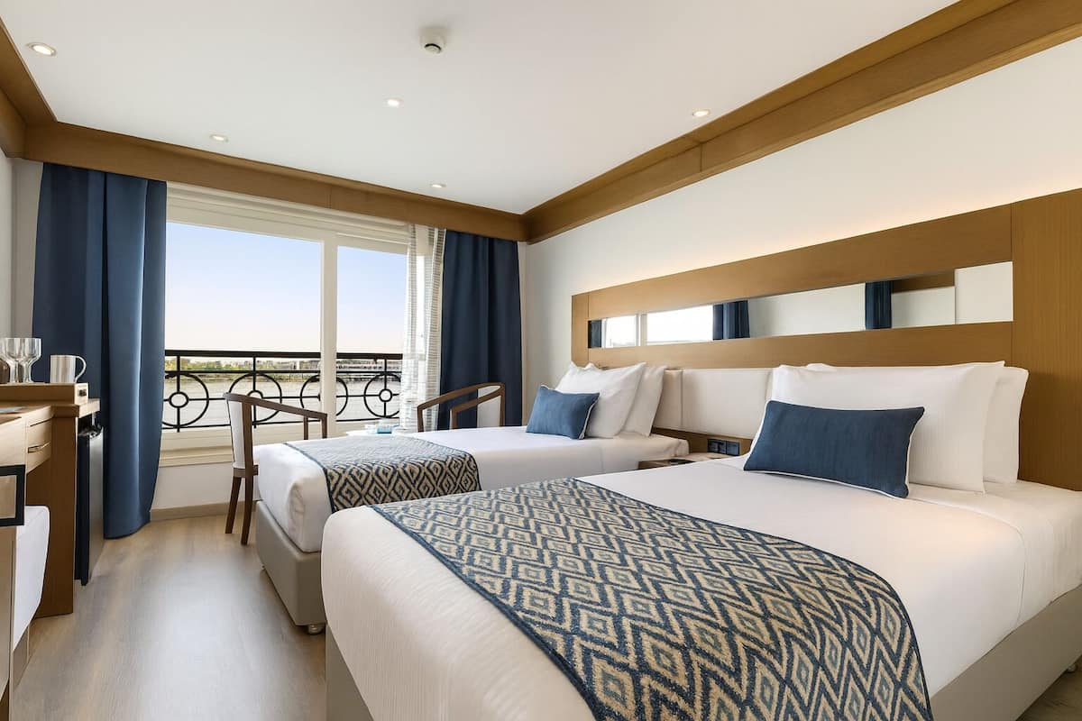 Deluxe Double Room, River View | In-room safe, blackout drapes, soundproofing