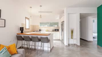 Family Apartment, 2 Bedrooms, Non Smoking, Beachside | Living area | TV