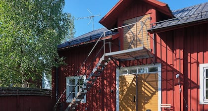 Relax with the family in this peaceful accommodation with a beautiful view.