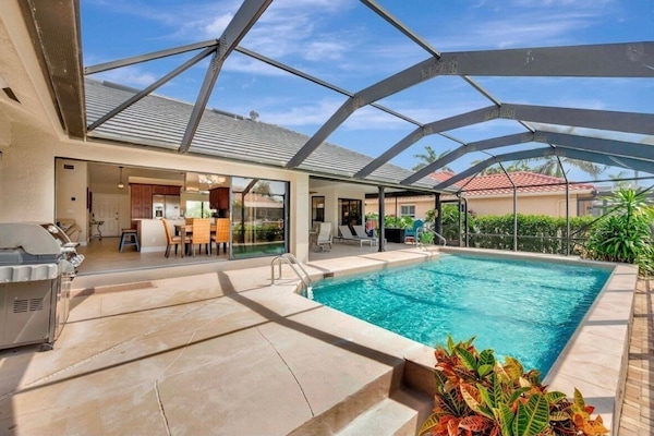 South facing pool on over sized patio coverred lanai for all day sunshine.