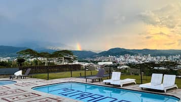 2 outdoor pools, open 9:00 AM to 10:00 PM, pool umbrellas, sun loungers