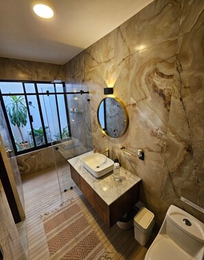 Shower, hair dryer, towels, soap