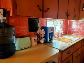 Fridge, coffee/tea maker, electric kettle, toaster