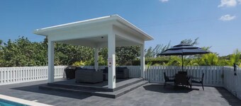 Marvelous 3-bedroom townhome with pool and ocean views in East End