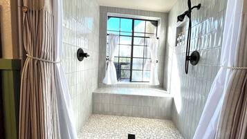 Shower, eco-friendly toiletries, hair dryer, towels