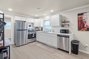 Microwave, oven, stovetop, dishwasher - 3 BR house on the historic black and gold park with splash pad in back yard a (Glenpool)