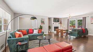 Smart TV, fireplace, foosball, books