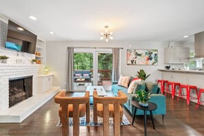 Smart TV, fireplace, foosball, books