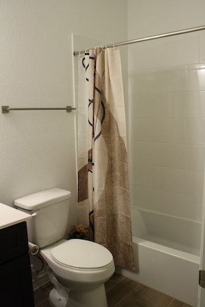 Shower, towels, soap, toilet paper