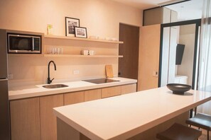 Fridge, microwave, stovetop, coffee/tea maker