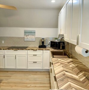 Fridge, microwave, stovetop, coffee/tea maker - Stylish 2BR Coastal Getaway with Beach Gear & Full Amenities Near Bethany Beach (Ocean View)