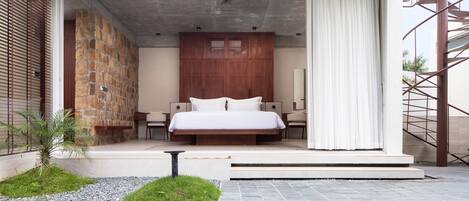 Executive Suite, Pool View | Desk, laptop workspace, iron/ironing board, free WiFi