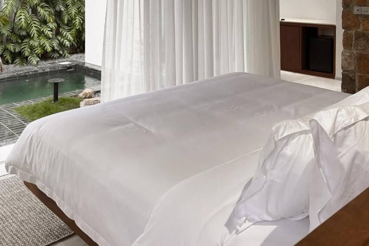 Executive Suite, Pool View | Desk, laptop workspace, iron/ironing board, free WiFi