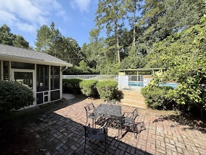 Outdoor dining - Southern Charm Home: Pool + Fireplace + Large Yard (Thomasville)