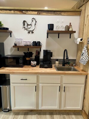 Fridge, microwave, coffee/tea maker, toaster