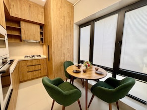Comfort Apartment, City View | Private kitchen