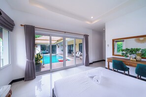 Romantic Villa, Pool View | In-room safe, blackout drapes, soundproofing, iron/ironing board