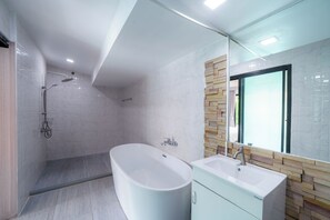 Romantic Villa, Pool View | Bathroom | Hair dryer, towels, soap, shampoo