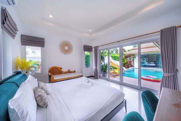 Romantic Villa, Pool View | In-room safe, blackout drapes, soundproofing, iron/ironing board