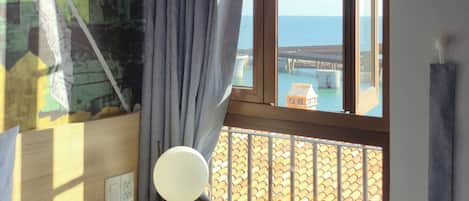 Deluxe Room, Beach View | Laptop workspace, blackout drapes, iron/ironing board, free WiFi