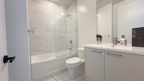 Hair dryer, towels, soap, shampoo