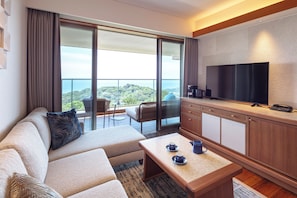 Deluxe Twin kamer, uitzicht op zee | Een kluis op de kamer, verduisterende gordijnen