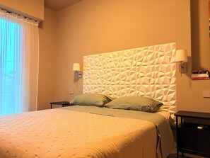 1 dormitorio, tabla de planchar con plancha, wifi y ropa de cama