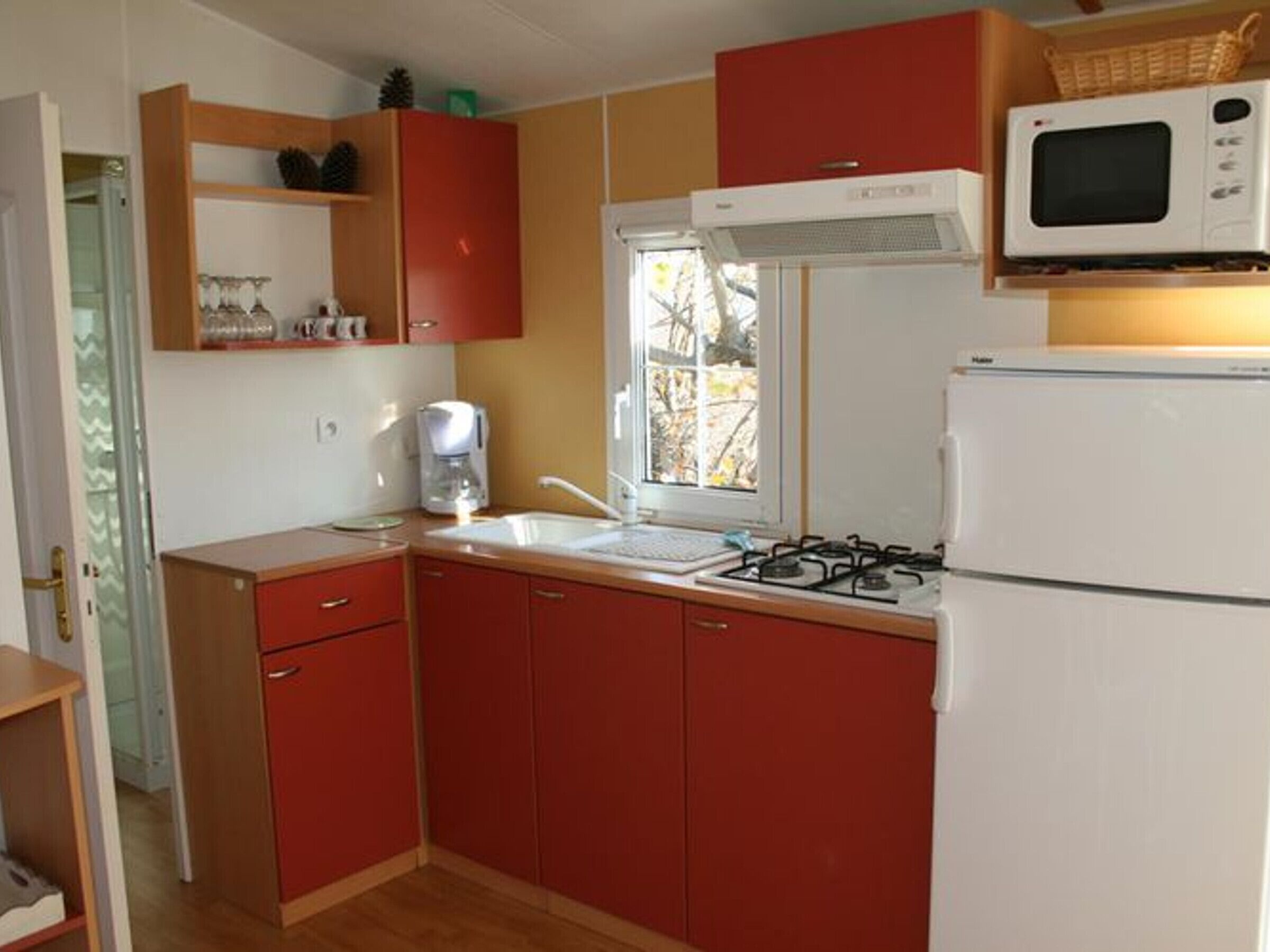 Coffee/tea maker, fridge, microwave