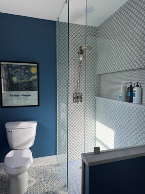 Shower, hair dryer, towels, soap