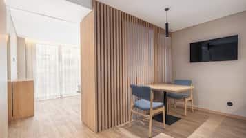 Apartment, 1 Queen Bed, Balcony, City View | In-room safe, desk, laptop workspace, blackout drapes