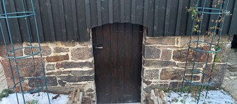 Historic signal box of the Erzgebirge Railway with garden for a romantic vacation.