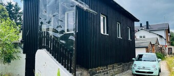Historic signal box of the Erzgebirge Railway with garden for a romantic vacation.