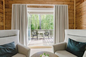 Habitación doble superior, vistas al parque | Zona de estar