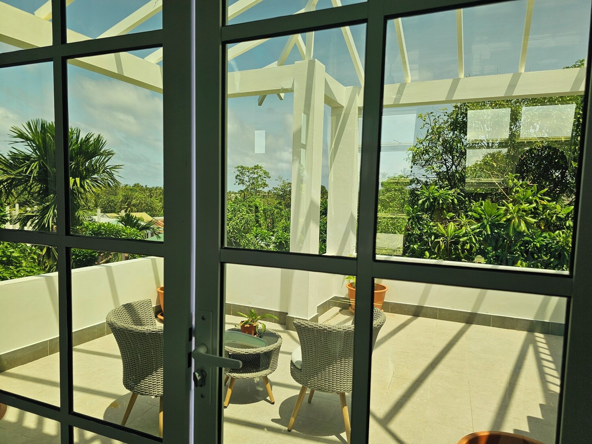 Family Triple Room, Garden View | View from room