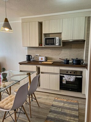 Microwave, oven, electric kettle, toaster