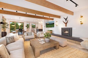 Smart TV, fireplace, foosball, books