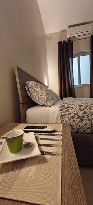 2 quartos, ferros/tábuas de passar roupa, Wi-Fi, roupa de cama