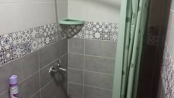 Shower, towels, toilet paper