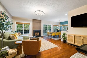 Smart TV, fireplace, table football, books