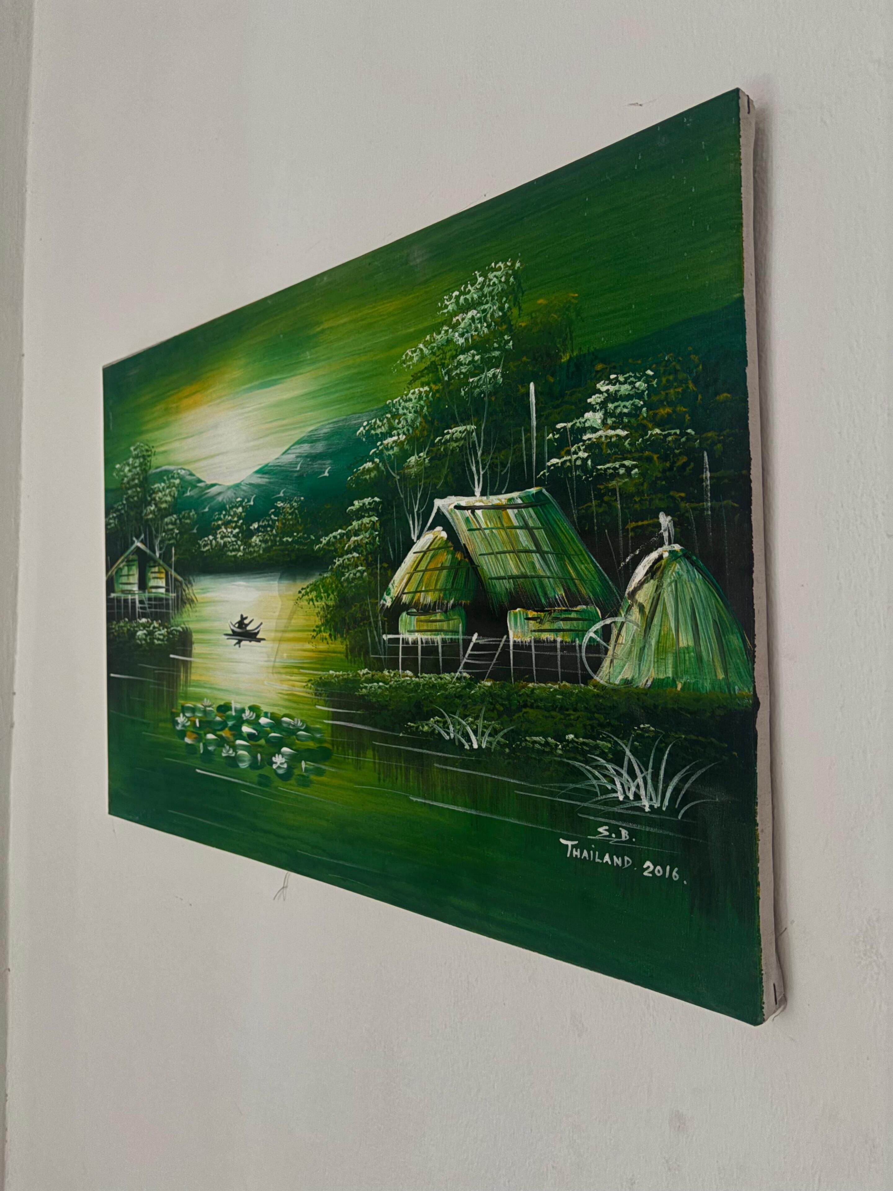 A painting of a tranquil lakeside scene with thatched-roof huts and a small boat.