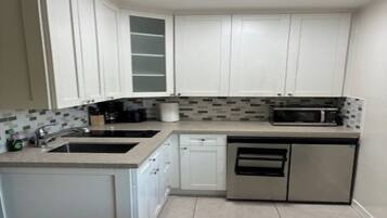 Fridge, microwave, coffee/tea maker, electric kettle