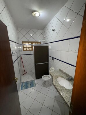 Shower, towels, soap, toilet paper