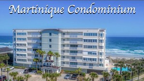 A multi-story condominium with a pool, located near the beach. - Newly, renovated, modern, OCEANFRONT 2 bedroom, 2 bathroom with 25 ft balcony (Port Orange)