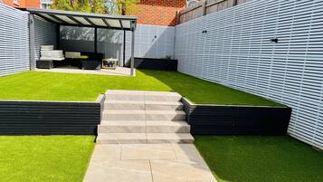 House, 4 Bedrooms, Balcony, Garden View | Terrace/patio
