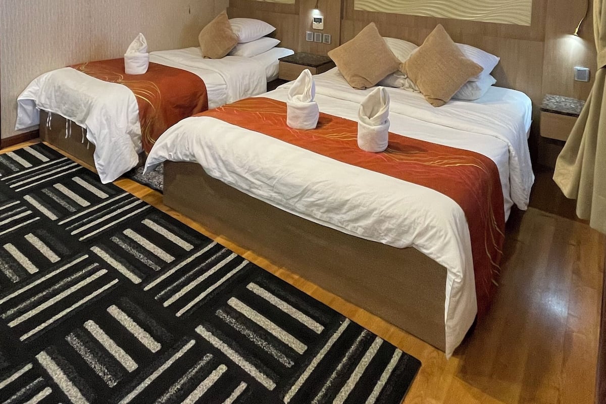 Luxury Triple Room | Bed sheets